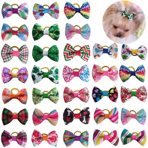 Collection of colorful hair bows with various patterns, including a small dog wearing one.