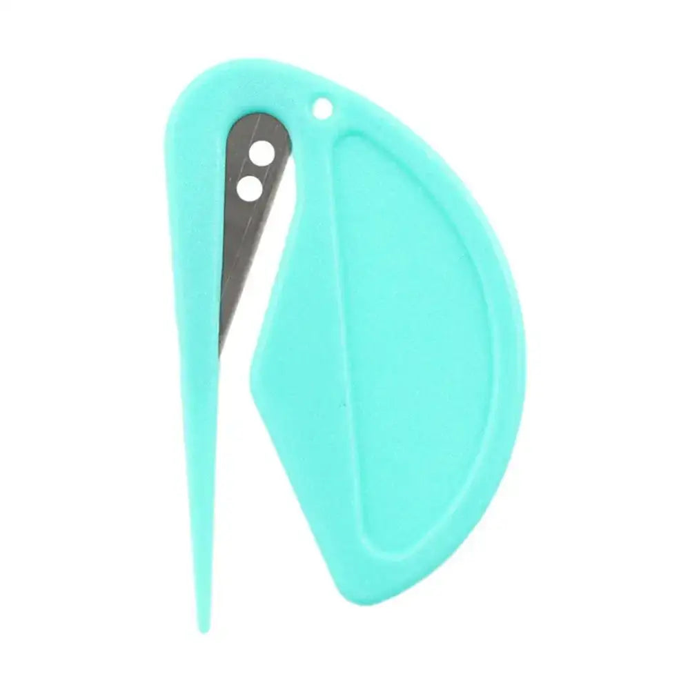 Teal-colored plastic hair clip or barrette with a curved shape and pointed end.