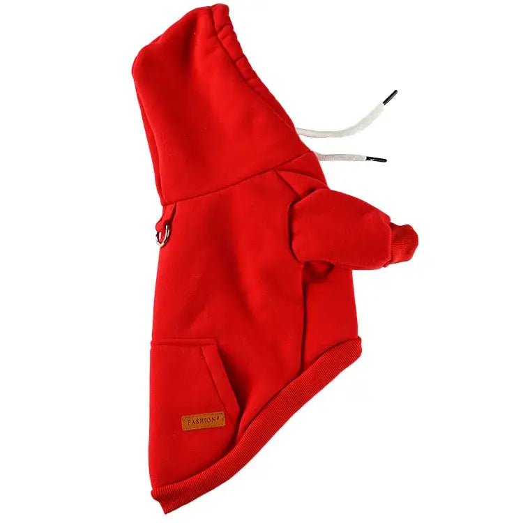 Bright red hooded dog coat with ear holes and a leash opening.