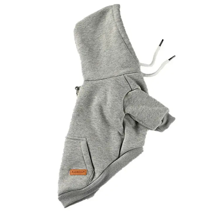 Gray hooded sweatshirt with drawstrings and a small orange label.