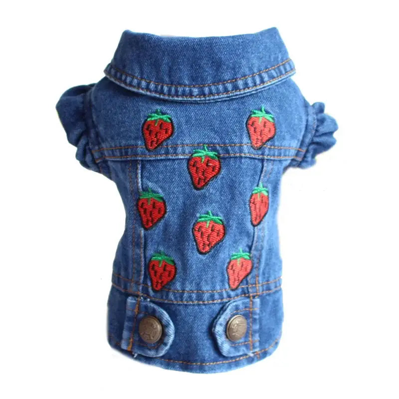 Denim dog jacket with embroidered strawberry patterns.