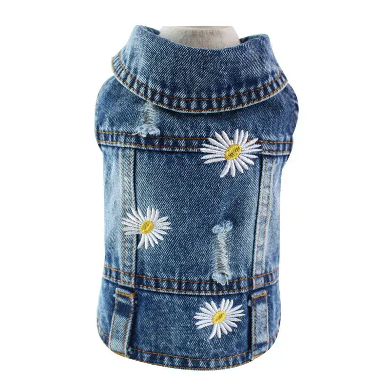 Denim dog vest with daisy flower embroidery.