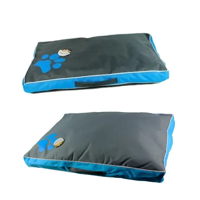 Dog bed with gray fabric and blue trim, featuring a paw print design.