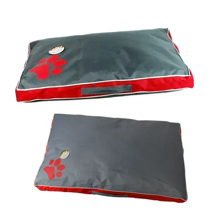 Dog beds with gray covers and red trim, featuring paw print designs.