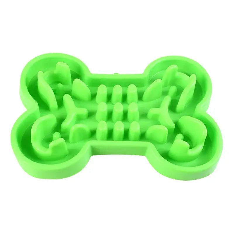 Bright green bone-shaped silicone dog food bowl with textured interior.