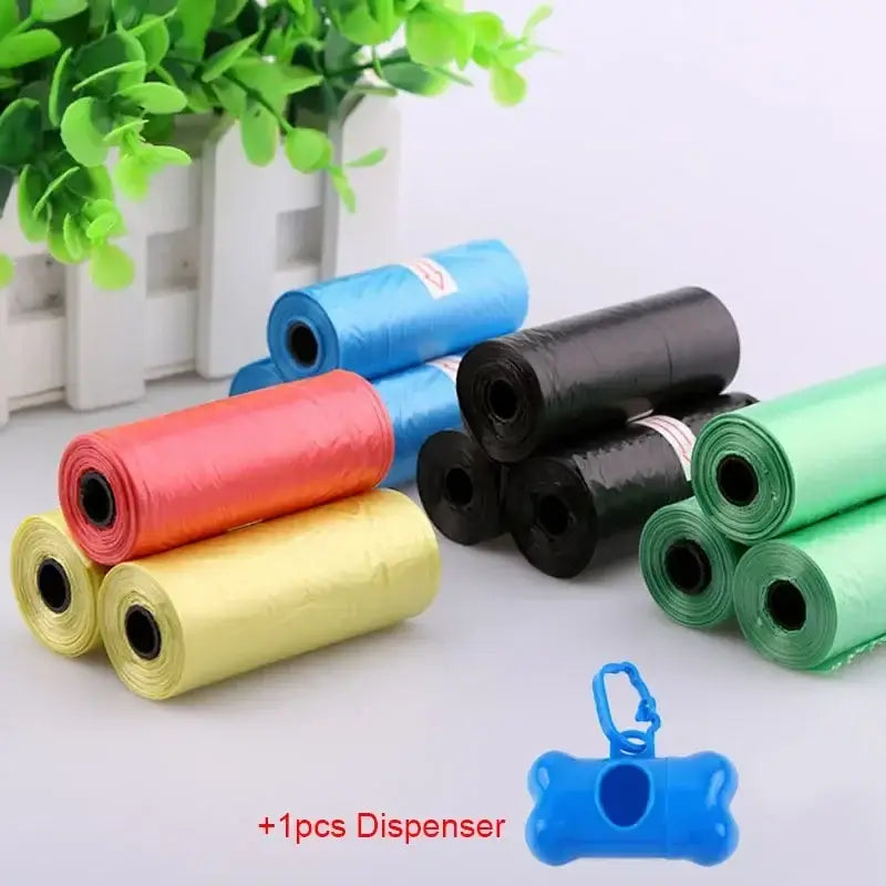 Colorful rolls of plastic bags with a blue bone-shaped dispenser.