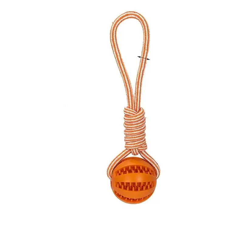 Orange rubber ball attached to a rope handle.