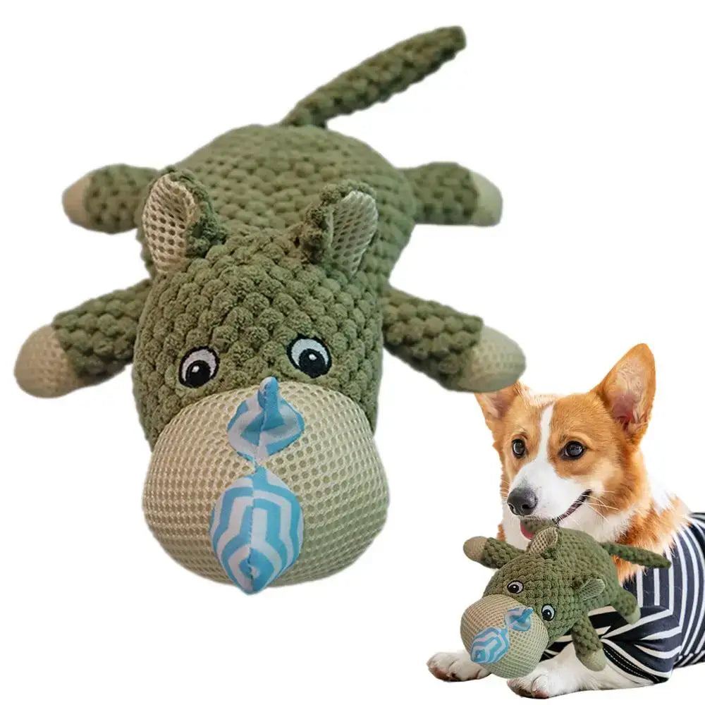 Plush green crocodile or alligator toy with a blue pattern on its snout.