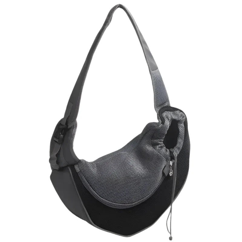 Black shoulder sling bag with a curved shape and adjustable strap.