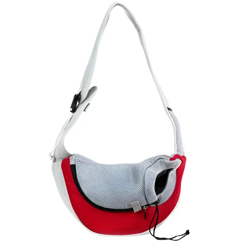 Pet carrier sling bag in red and white with mesh panel.