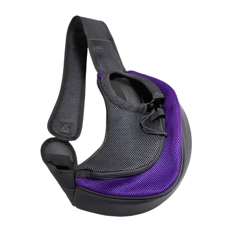 Pet carrier sling with a purple accent and mesh material.