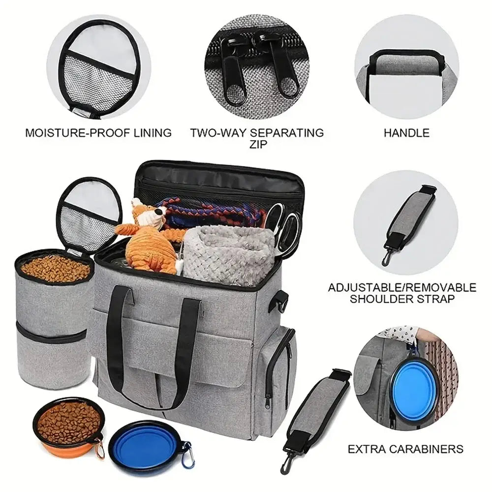 Pet travel bag with multiple compartments and accessories for carrying pet supplies.