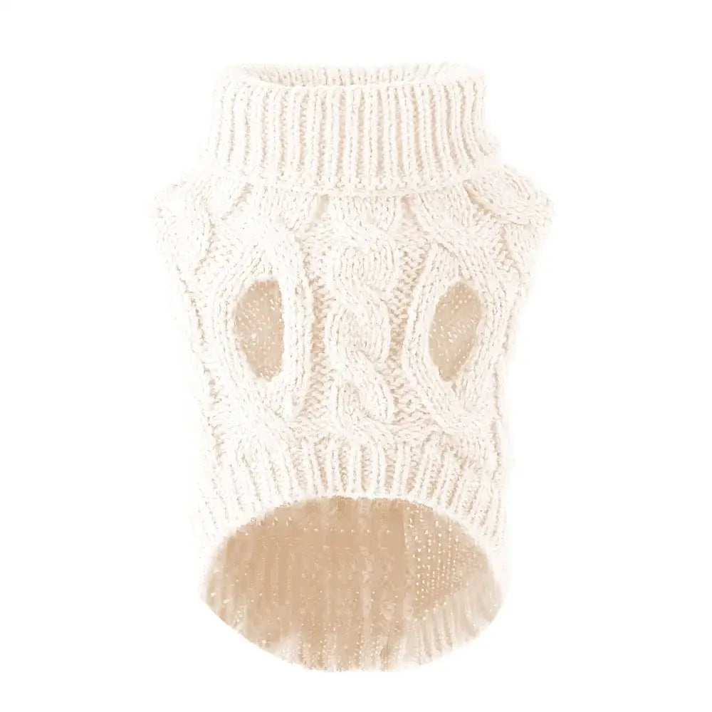 White knitted sweater or vest with a turtleneck and decorative cable patterns.