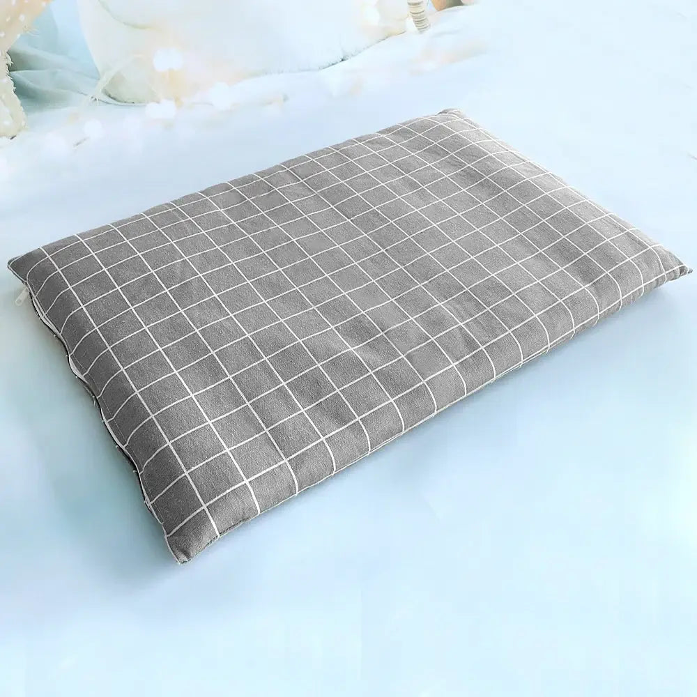 Gray and white checkered rectangular pillow or cushion.