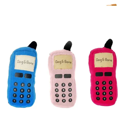 Three colorful plush toy cell phones in blue, pink, and hot pink.