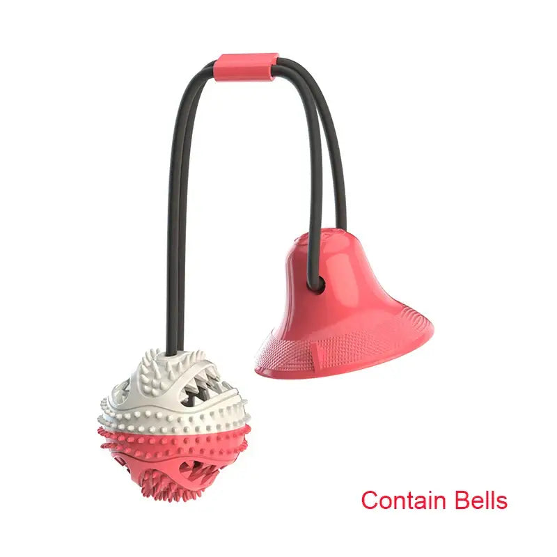 Dog toy with a textured ball and bell-shaped attachment connected by a flexible handle.