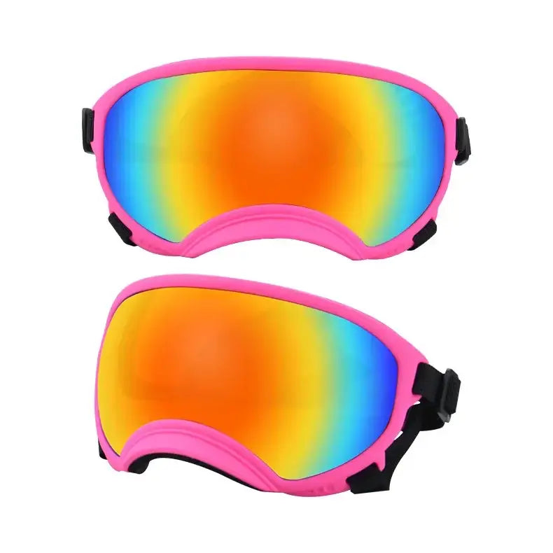 Pair of colorful ski goggles with rainbow-tinted lenses and pink frames.