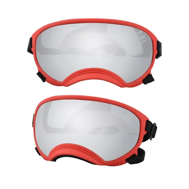 Pair of red-framed ski goggles with mirrored lenses.