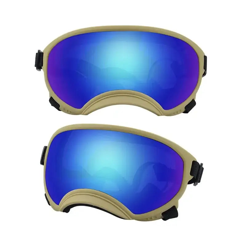 Pair of ski or snowboard goggles with blue mirrored lenses and tan frames.