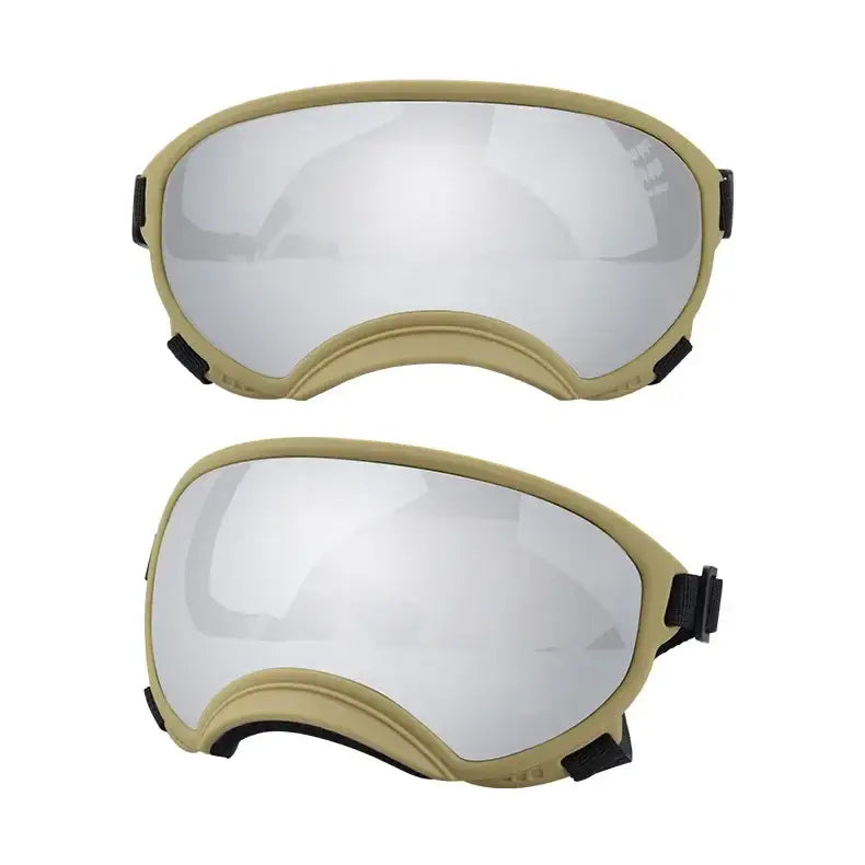 Pair of tan-framed ski or snowboarding goggles with mirrored lenses.