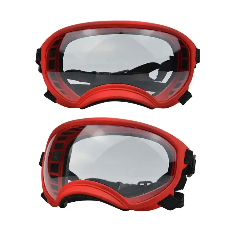 Red ski or snowboard goggles with clear lenses.