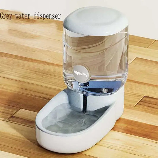 Grey water dispenser with a clear glass reservoir and white base.