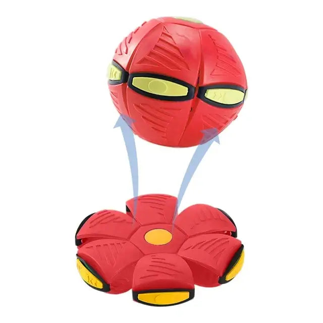 Red spherical toy with glowing eyes connected to a flower-shaped base by light beams.