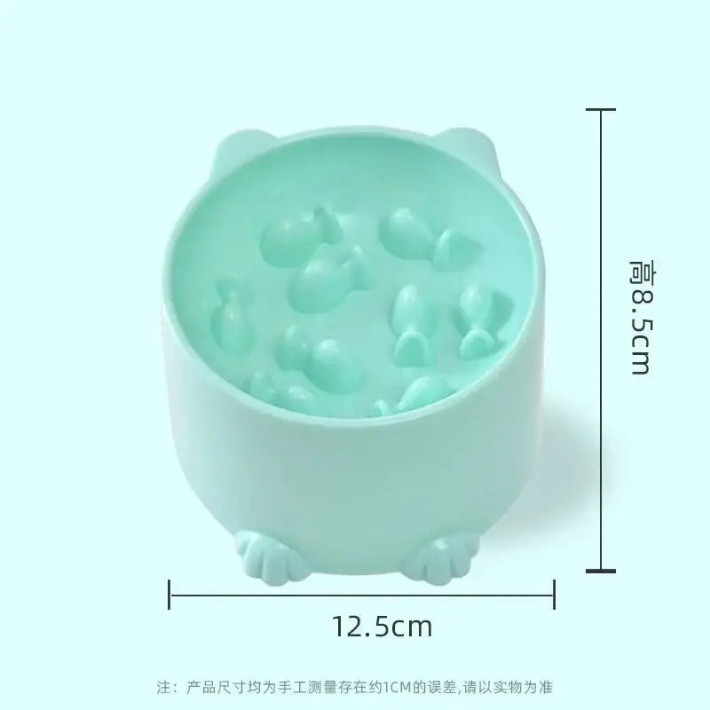 Mint green bear-shaped bowl or container with paw-like feet.