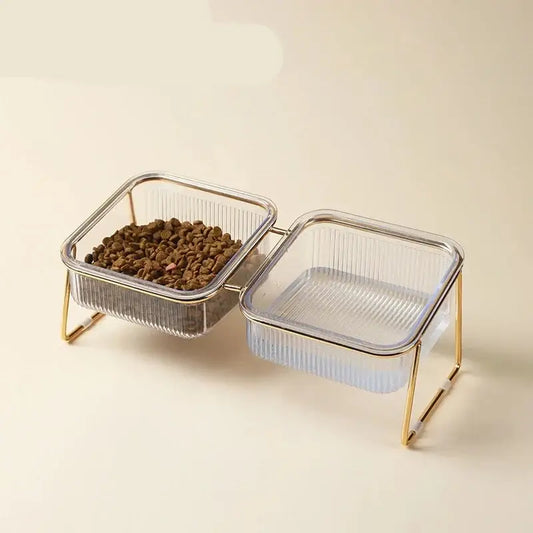 Double pet food bowl set with glass containers and gold-colored metal stands.