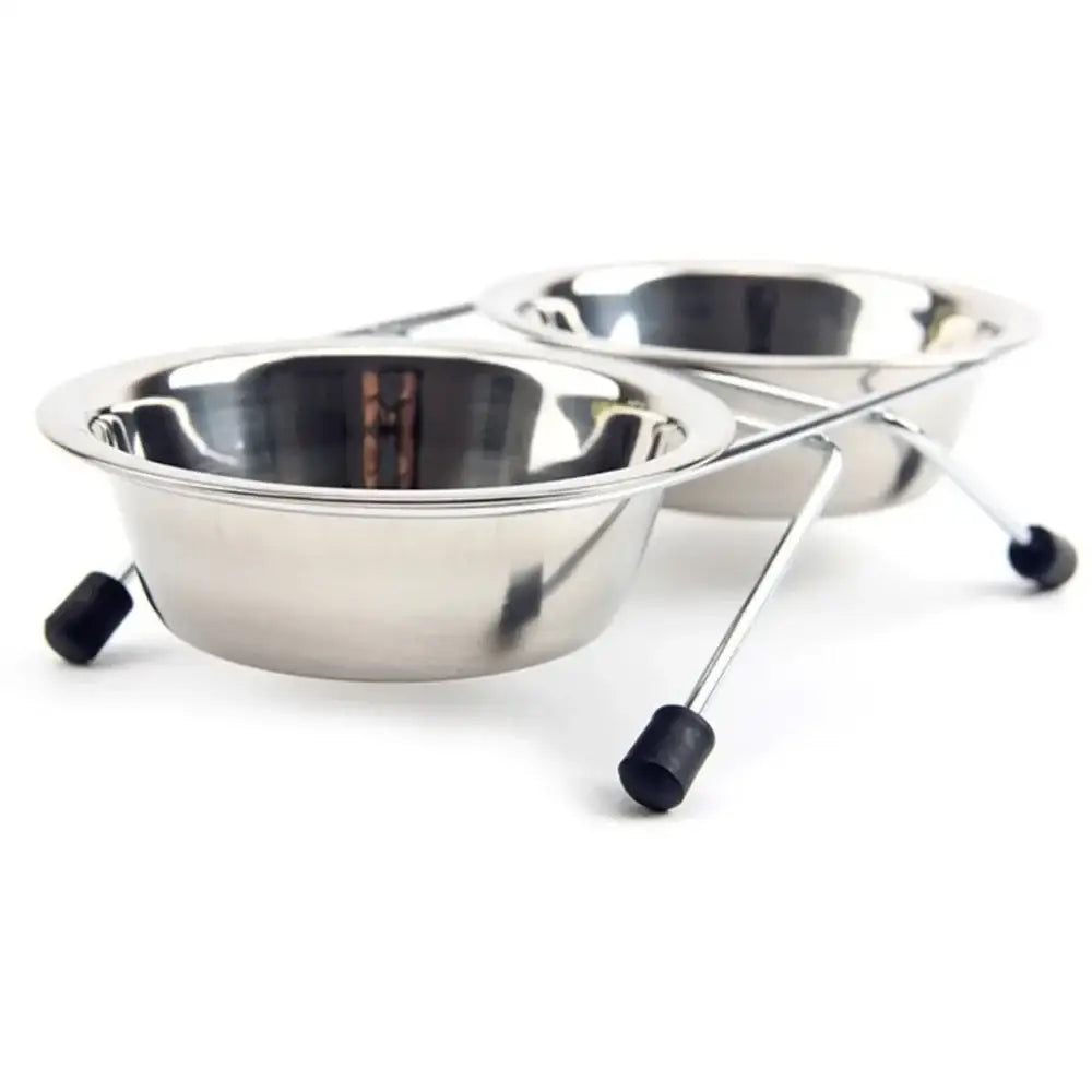 Stainless steel pet food bowls on a raised stand with rubber feet.