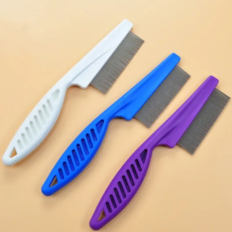 Colorful flea combs with plastic handles and metal teeth.