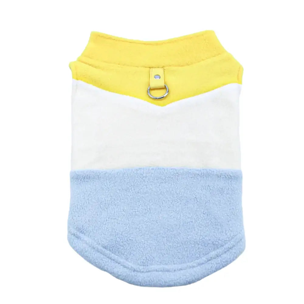 Tricolor pet shirt or vest with yellow, white, and light blue sections and a small metal ring attachment.