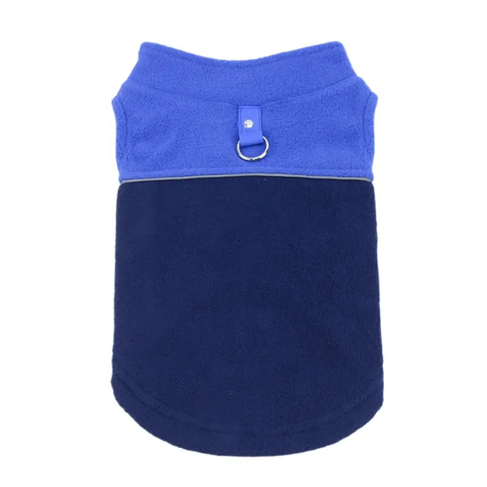 Two-toned blue dog vest with a metal ring attachment.