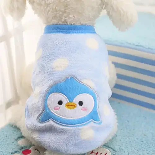 Fluffy white pet sweater with a cute blue penguin appliqué on the back.