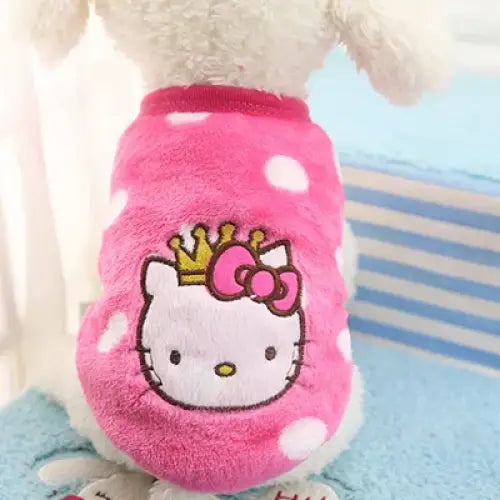 Pink Hello Kitty plush dog outfit with white polka dots and a crown design.