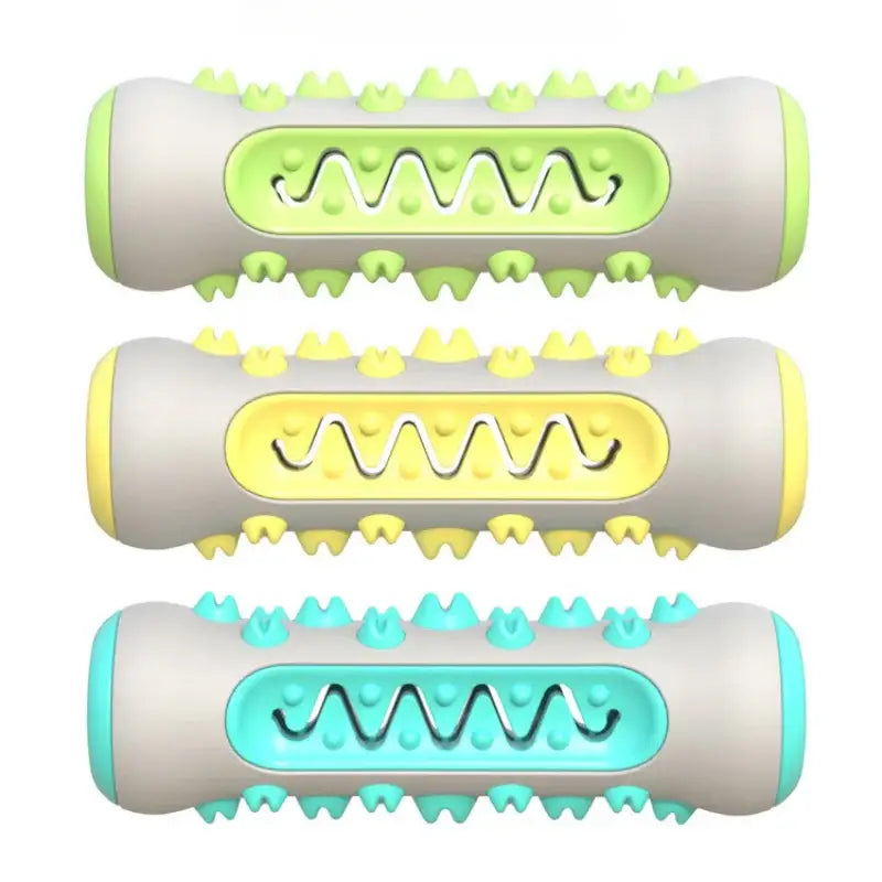 Cylindrical dog chew toys with textured surfaces and wavy patterns in green, yellow, and blue colors.