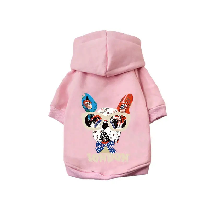 Pink hooded dog sweatshirt with a colorful cartoon dog face design on the front.