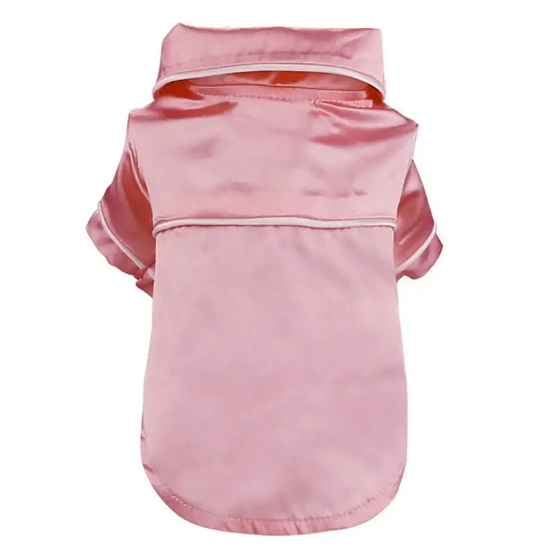 Pink satin or silk pet shirt with short sleeves and a collar.