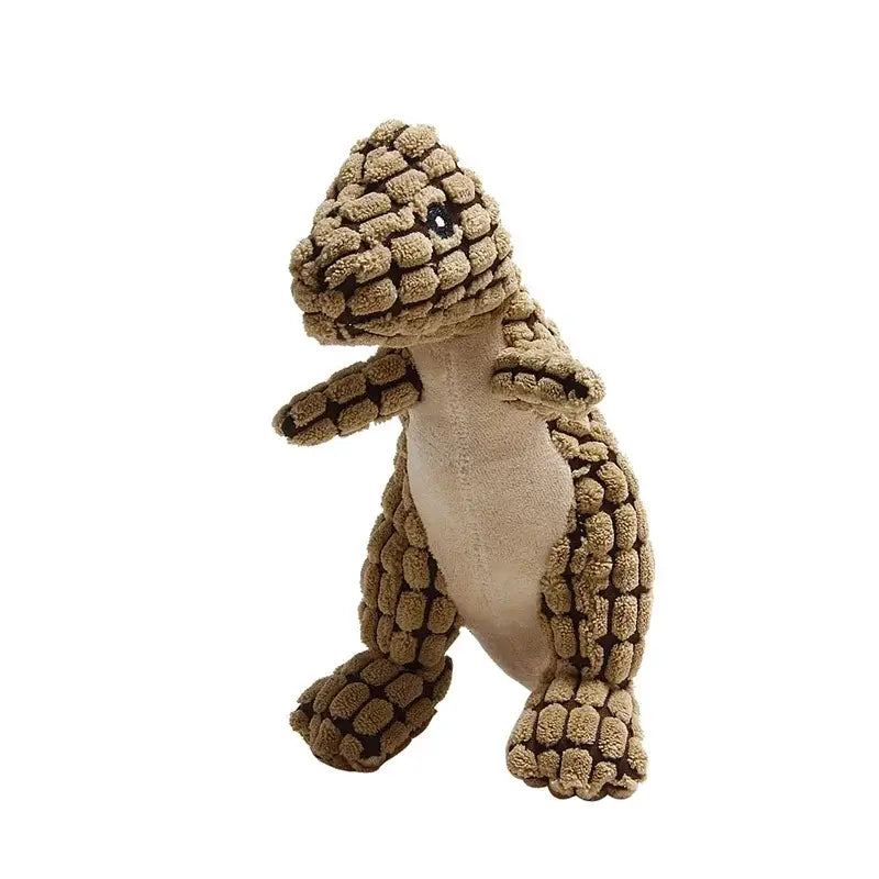 Plush toy dinosaur with a textured, segmented body resembling scales or armor.