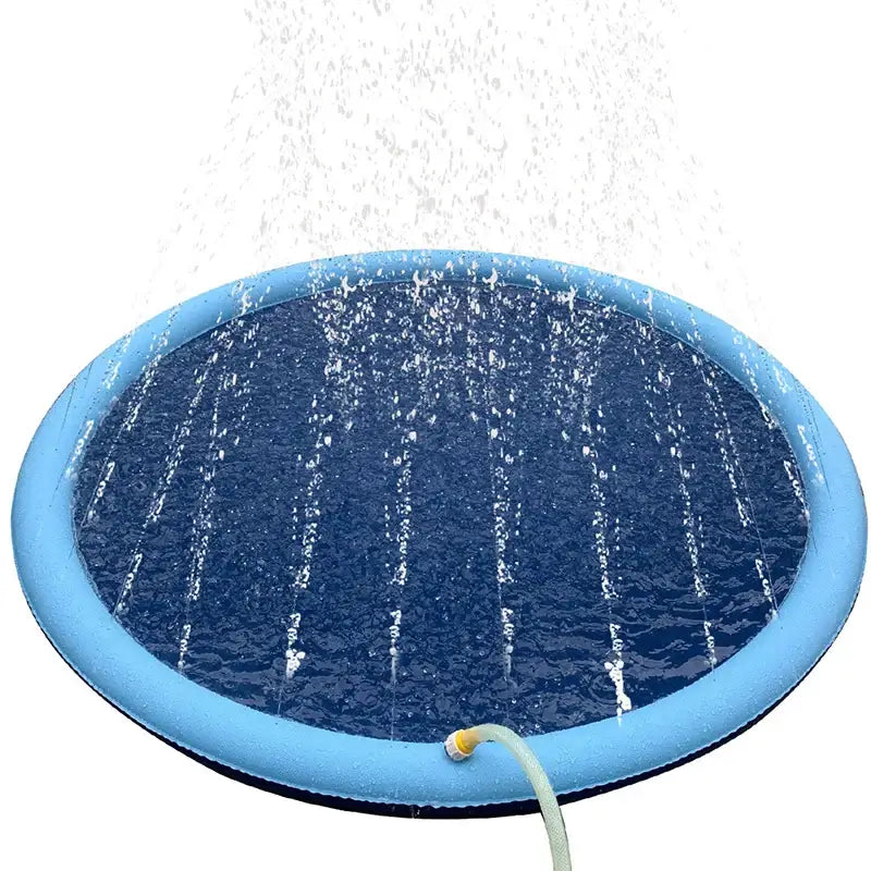 Circular blue inflatable splash pad with water spraying upwards from its surface.