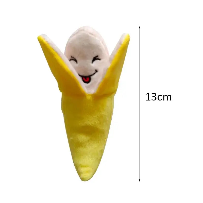 Smiling banana-shaped plush toy with a cheerful face.