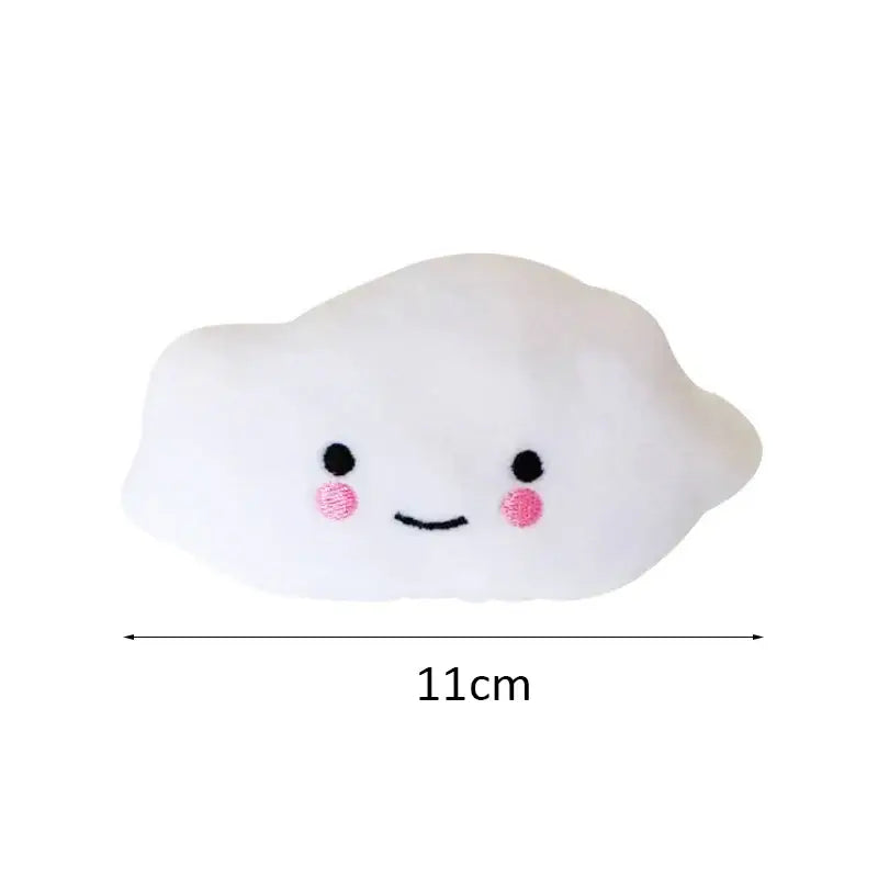 Cute plush cloud toy with a smiling face and rosy cheeks.