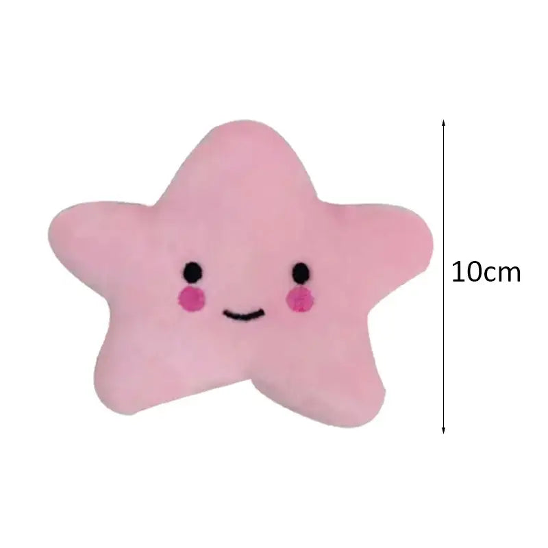 Pink star-shaped plush toy with a cute smiling face.