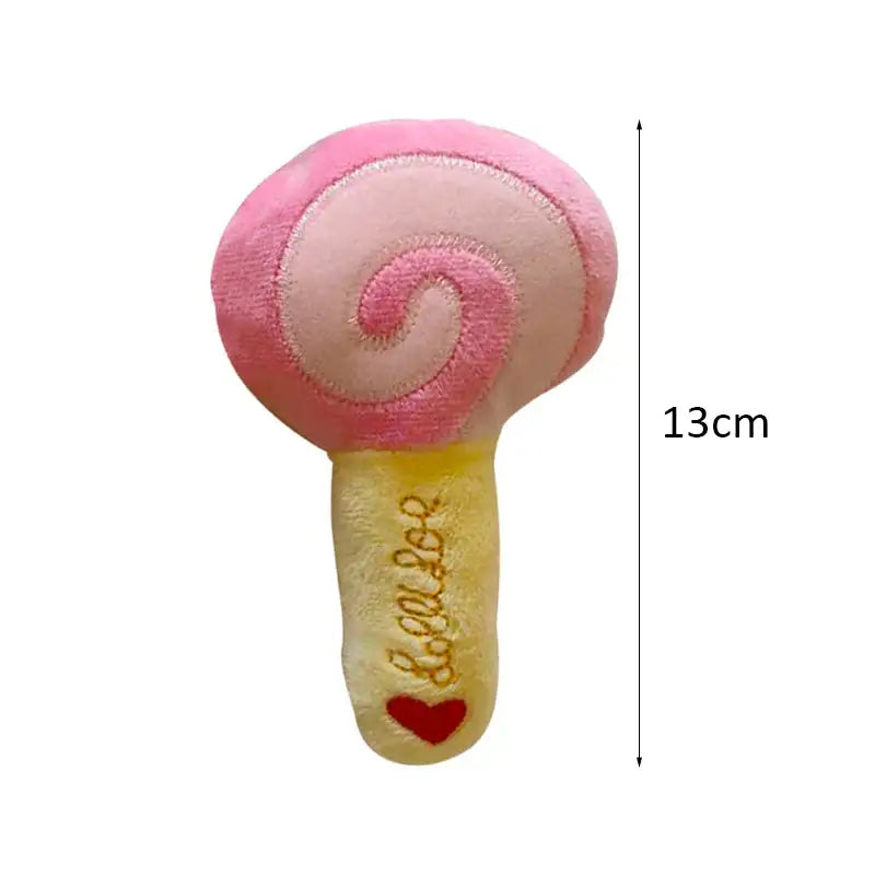 Pink and yellow plush lollipop toy with a swirl pattern.