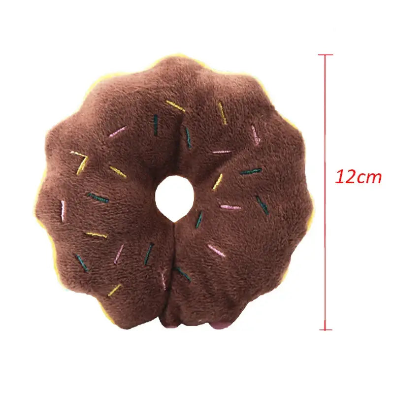 Plush chocolate donut with colorful sprinkles and a 12cm measurement indicator.