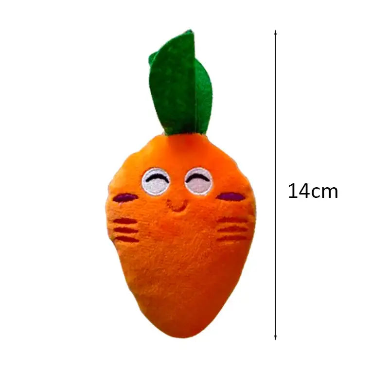 Plush toy carrot with a smiling face and green leaf on top.