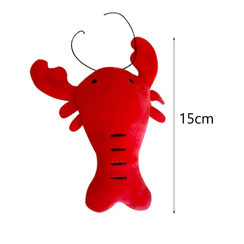 Red plush lobster toy with antennae and claws.