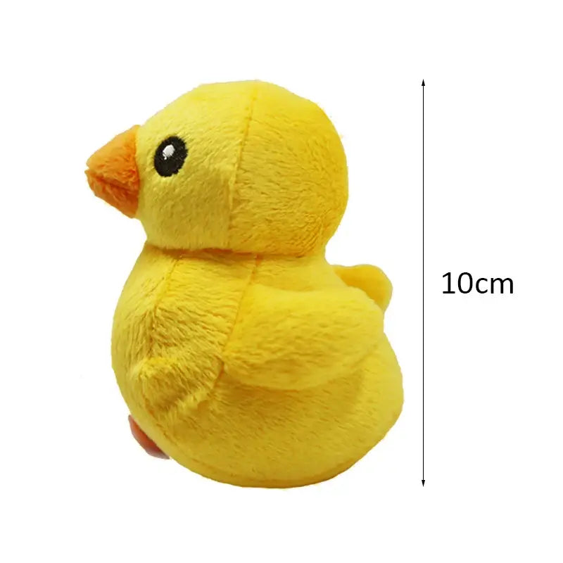 Yellow plush toy duck with a round body and orange beak.