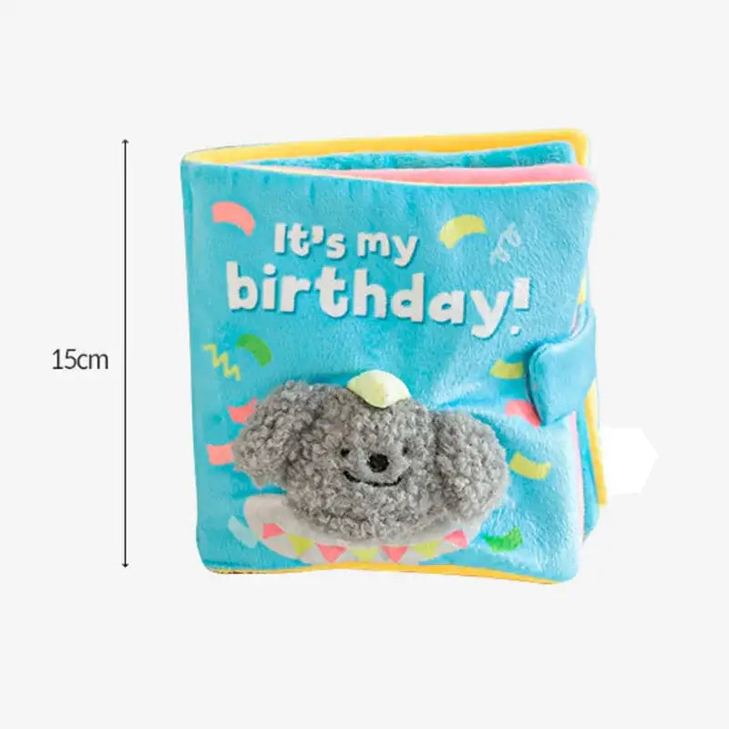 Soft, plush children’s book with ’It’s my birthday!’ text and a fuzzy gray character on the cover.