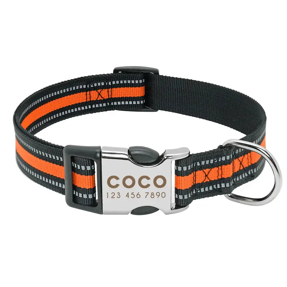 Reflective dog collar with orange stripes and a personalized metal tag reading ’COCO’.